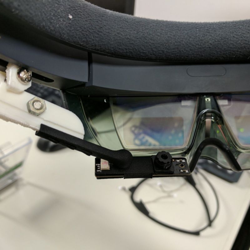 Head-mounted display with an eye-tracking camera add-on